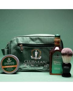 Clubman Shave Essentials Dopp Kit Bag flanked by Whisky Woods Shave Lotion, Shave Brush, & Shave Soap