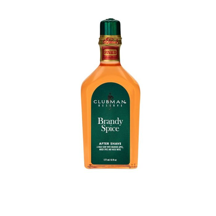 A 6 ounce bottle of Clubman Reserve Brandy Spice After Shave Lotion featuring its brandy-colored liquid contents