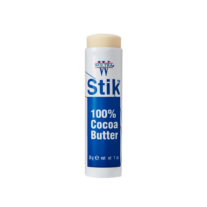 An uncovered 1-ounce tube of Woltra 100% Cocoa Butter Stik with an exposed tip