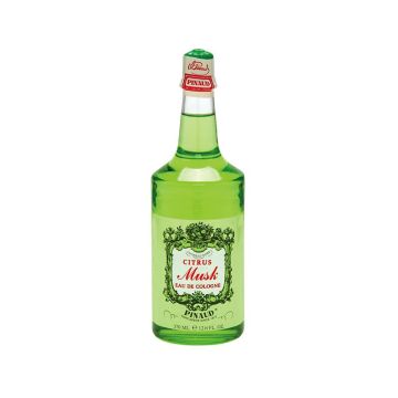 A clear 12.5 ounce bottle of Clubman Pinaud facing forward featuring its stylized label and sealed top cap